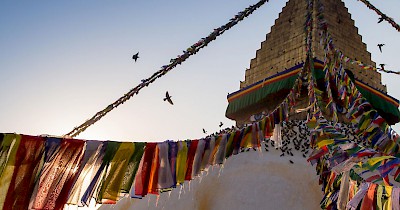 The Buddhist stupa of Boudhanath dominates the skyline. The ancient Stupa is one of the largest in the world. As of 1979, Boudhanath is a UNESCO World Heritage Site